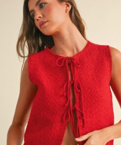 CÁRDIGAN DE PUNTO ATADO EN LA PARTE DELANTERA